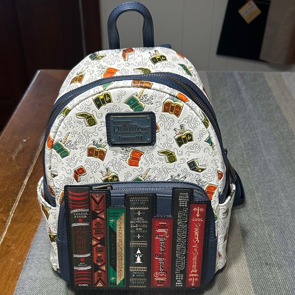 Loungefly Handbags - Loungefly Fantastic Beasts Secrets of Dumbledore- NWOTS Mini Backpack- Universal